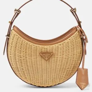 Arqué woven leather-trimmed shoulder bag