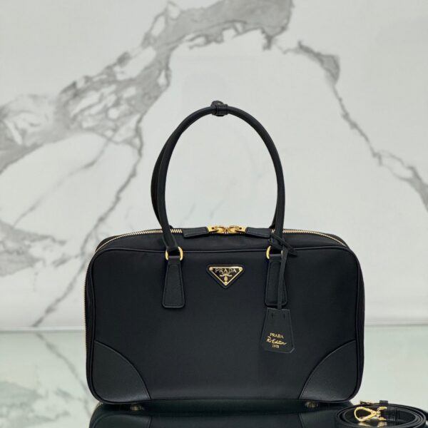 LARGE TOP HANDLE BAG 35 IN BLACK NYLON AND CALFSKIN TRIM