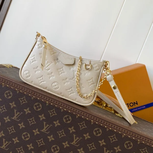 LV EASY POUCH ON STRAP 19 IN BEIGE MONOGRAM EMPREINTE LEATHER