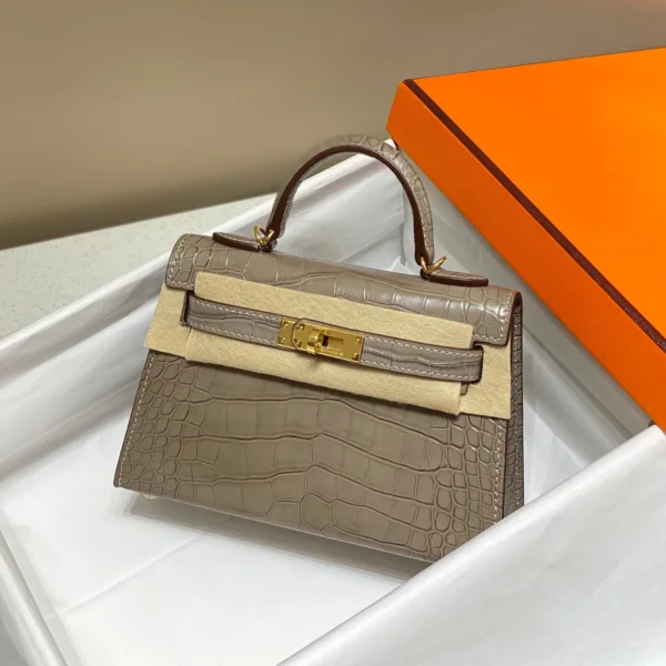 HN MINI KELLY IN MOCHA BROWN CROCODILE SKIN GOLD HARDWARE