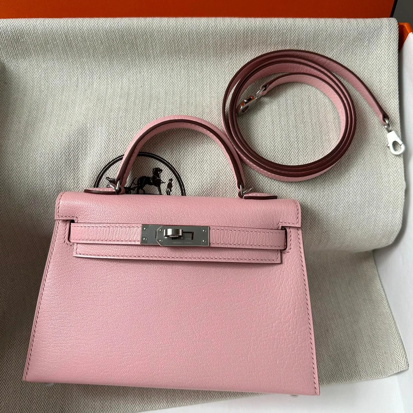 HN Mini Kelly 20 bag in Rose Sakura leather with silver hardware