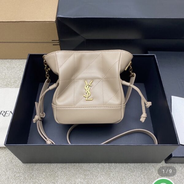 Saint Laurent Jamie mini shoulder pouch in beige lambskin leather.