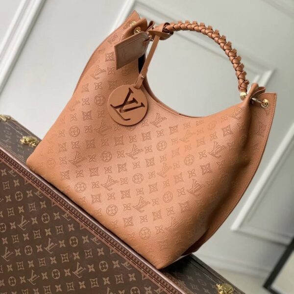 Louis Vuitton Carmel Mahina Leather Hobo Bag in Cognac